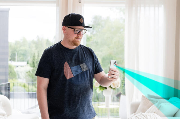 Person scanning a property with the CubiCasa app